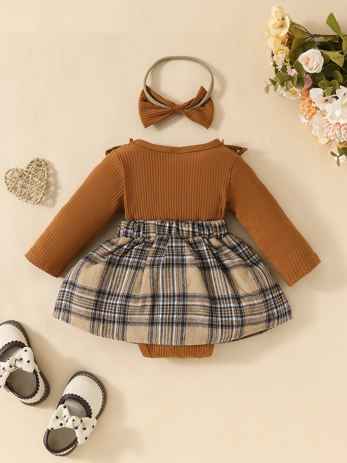 baby jumpsuit with plaid skirt and bow