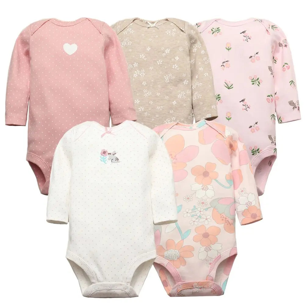 stack of 5 cotton baby bodysuits in neutral tones