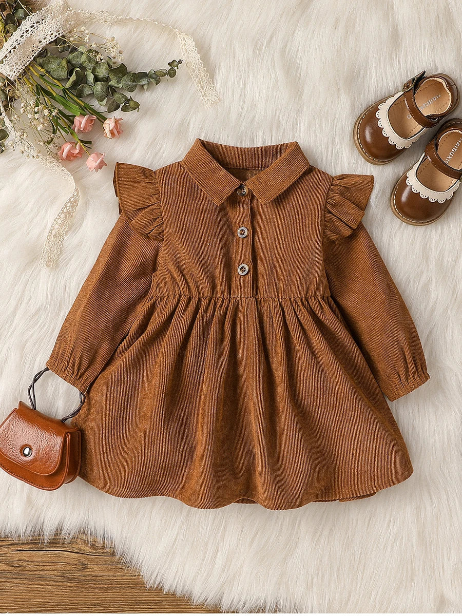 baby girl in vintage holiday dress with collar