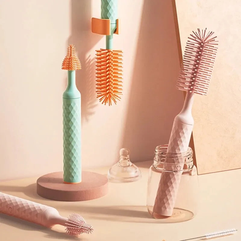 electric baby bottle brush cleaning a bottle