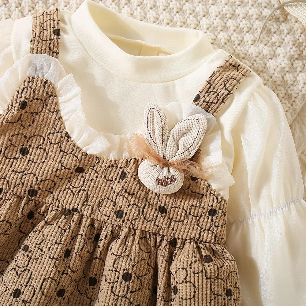 fall-themed baby dress with boots and cardigan