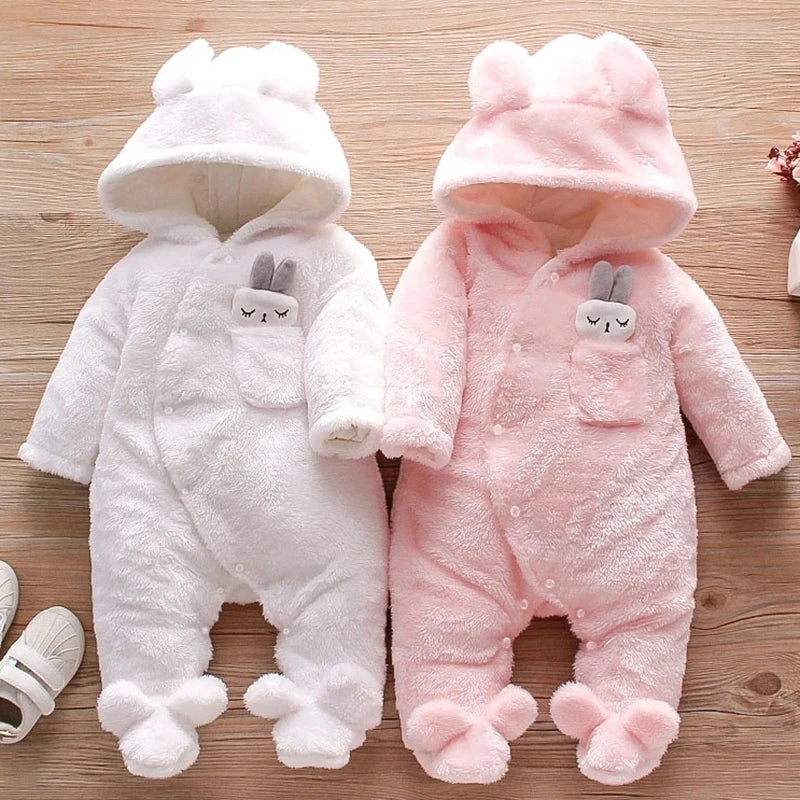 baby in plush fleece hooded jumpsuit