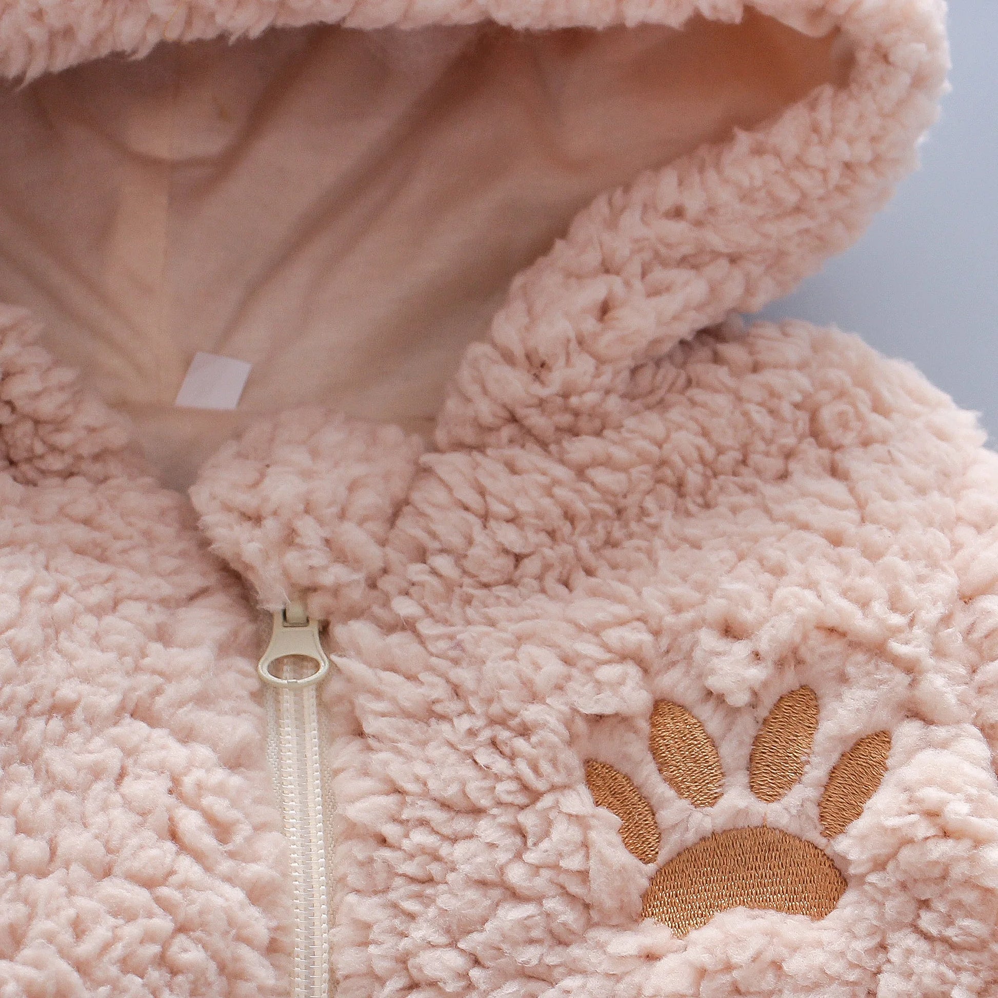 soft baby onesie with bear face and details